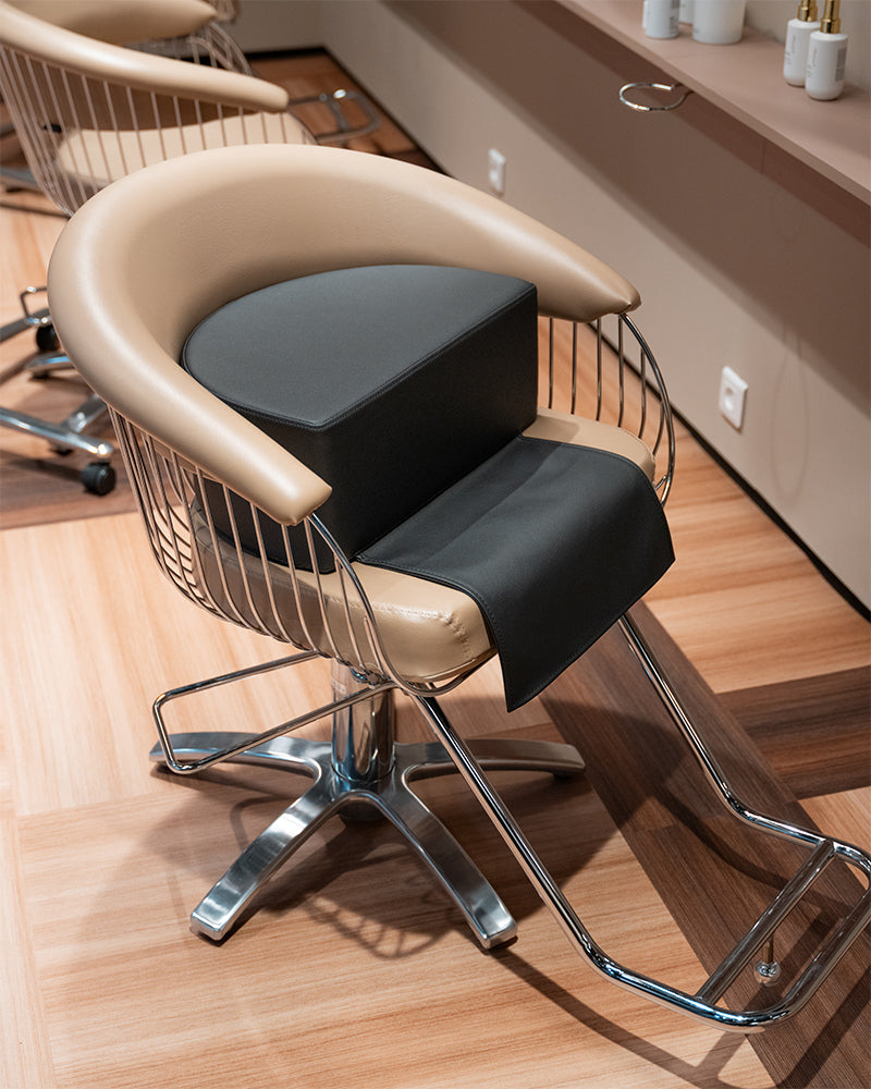 Child booster seat for styling chair